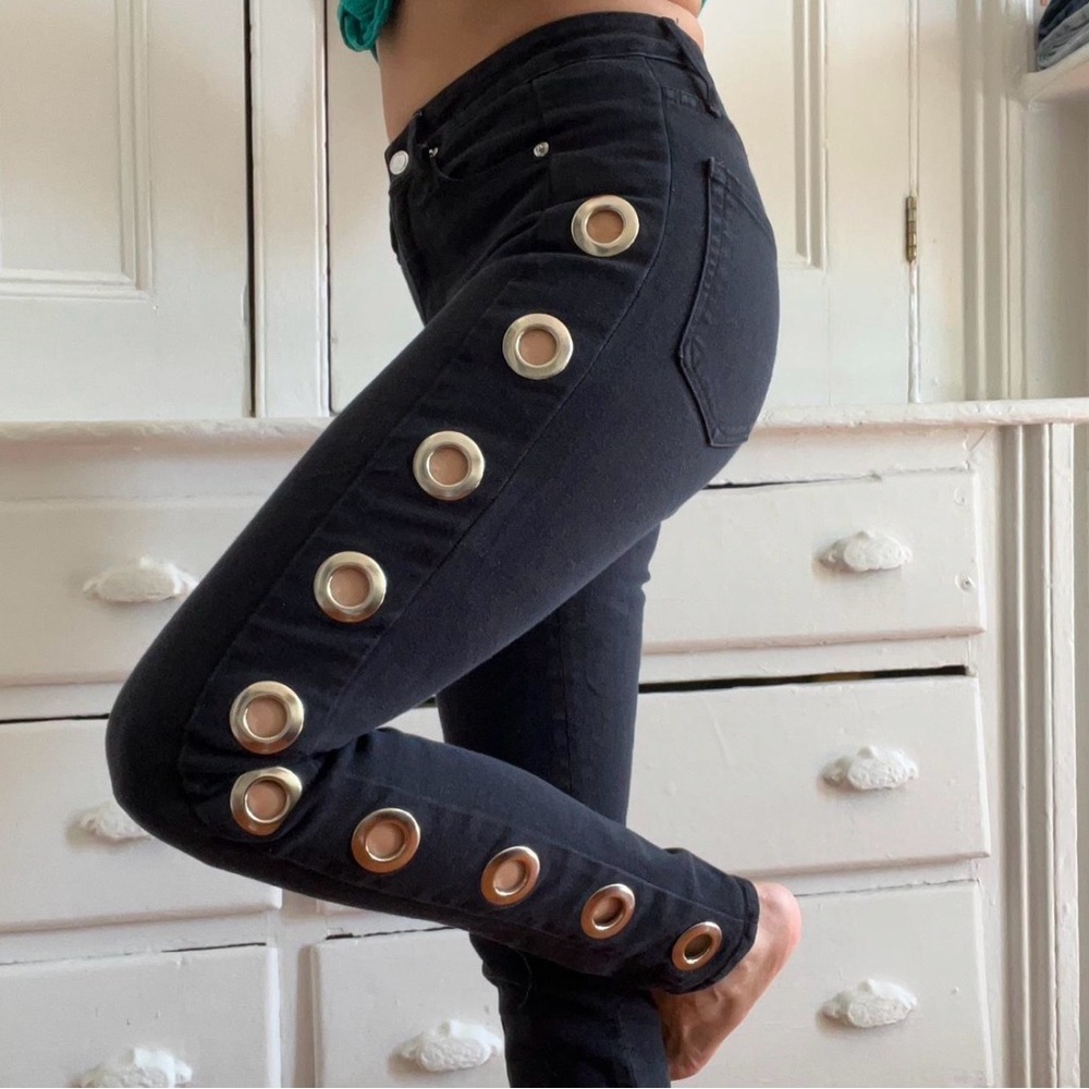 Good American Black Skinny High Rise Metal Grommet Jeans